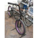 A black Ruption young person's BMX style bicycle