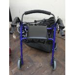 A fold up light weight push along mobility scooter and a four wheel zimmer frame with seat,