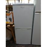 A small LEC half and half fridge freezer