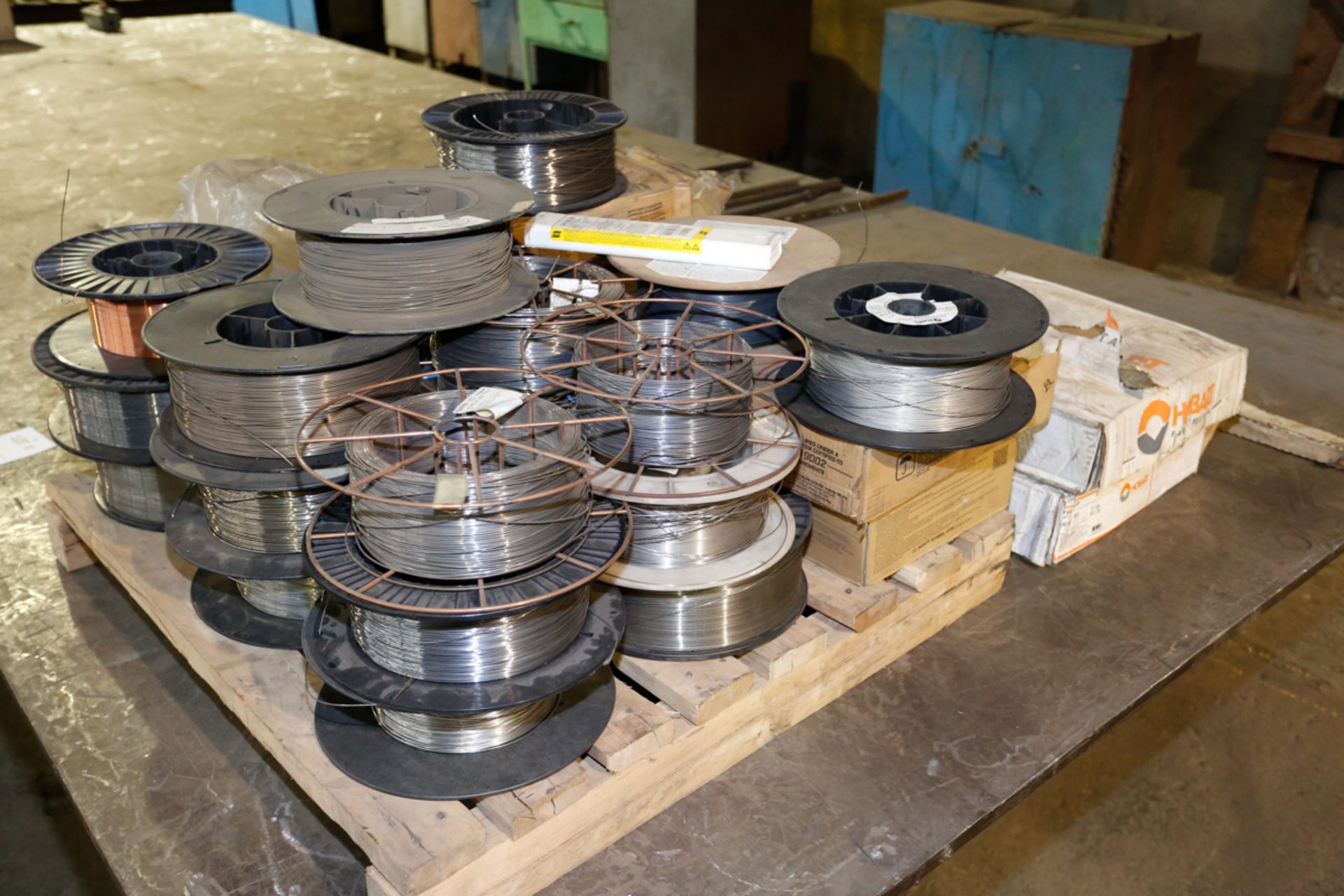 LOT OF +/- ASSORTED SPOOLS OF WELDING WIRE