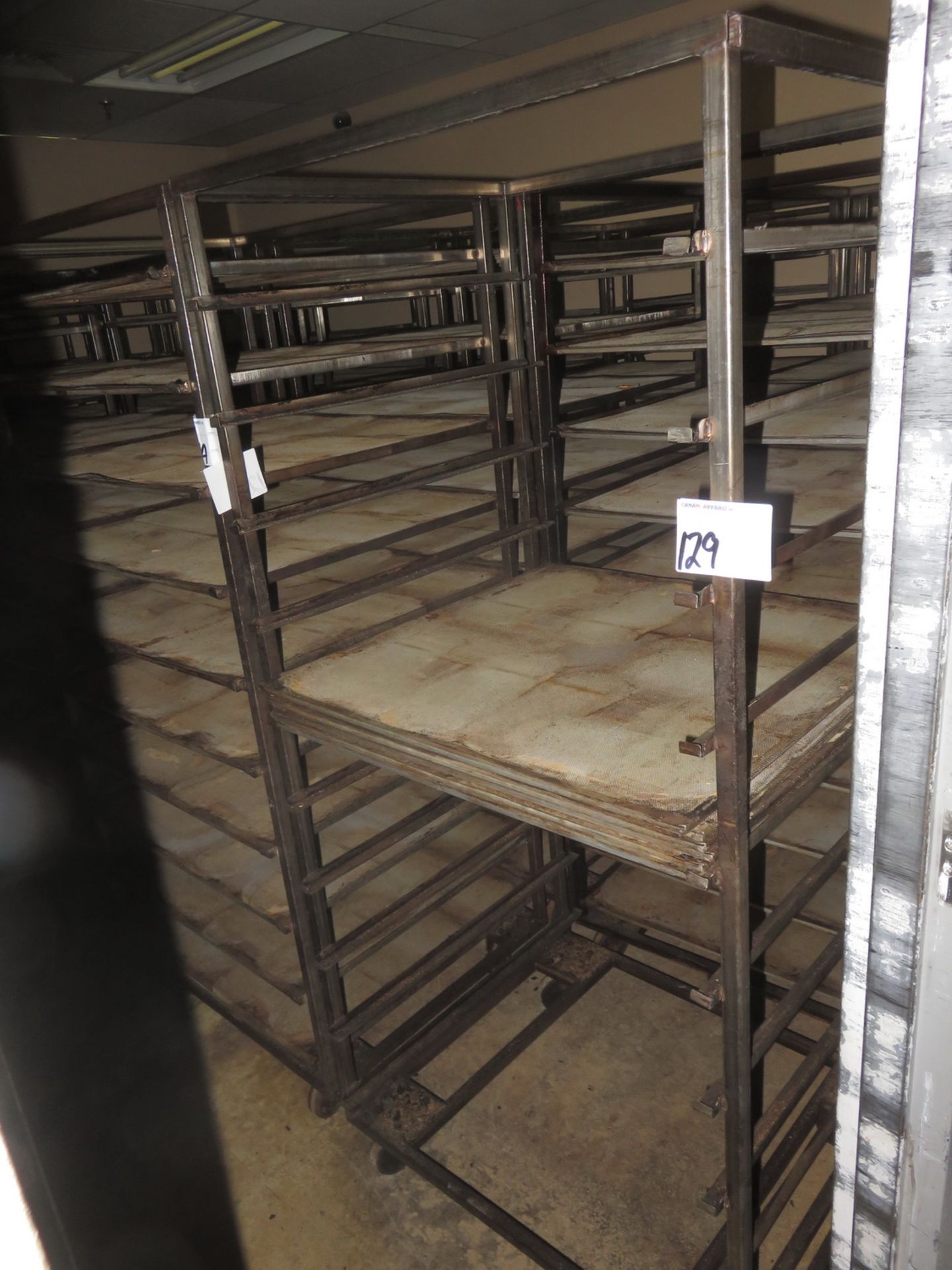 UNITS - STEEL APPROX 29" X 33" X 74"H BAKING PAN TROLLEY RACKS W/ ASSORTED AMOUNTS OF BAKING TRAYS