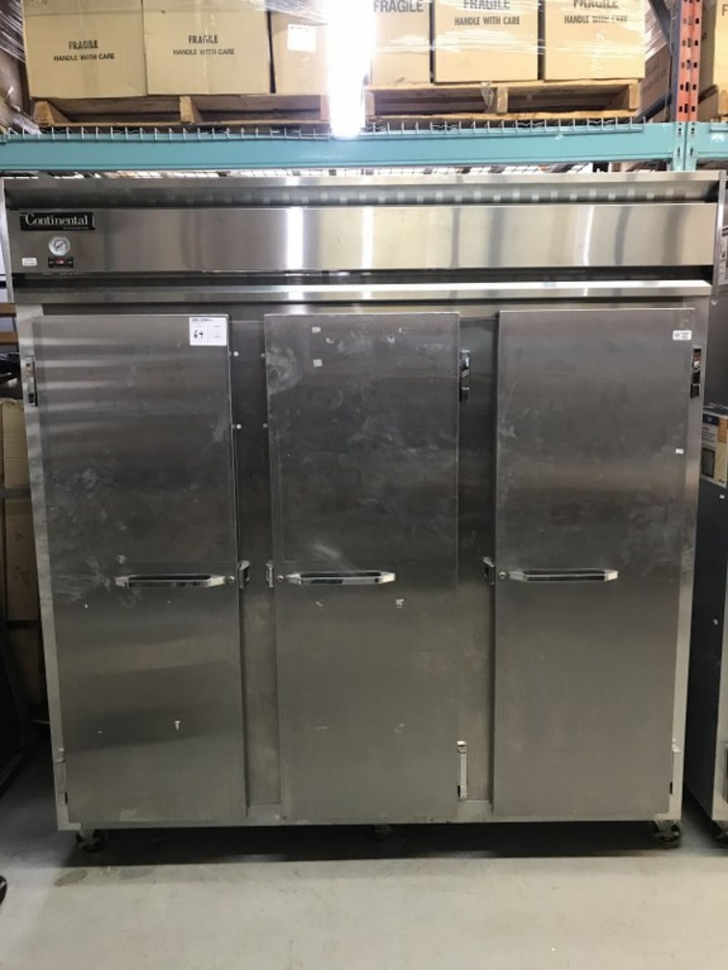 CONTINENTAL - 3-DOOR STAINLESS STEEL REFRIGERATOR. MODEL # 3R