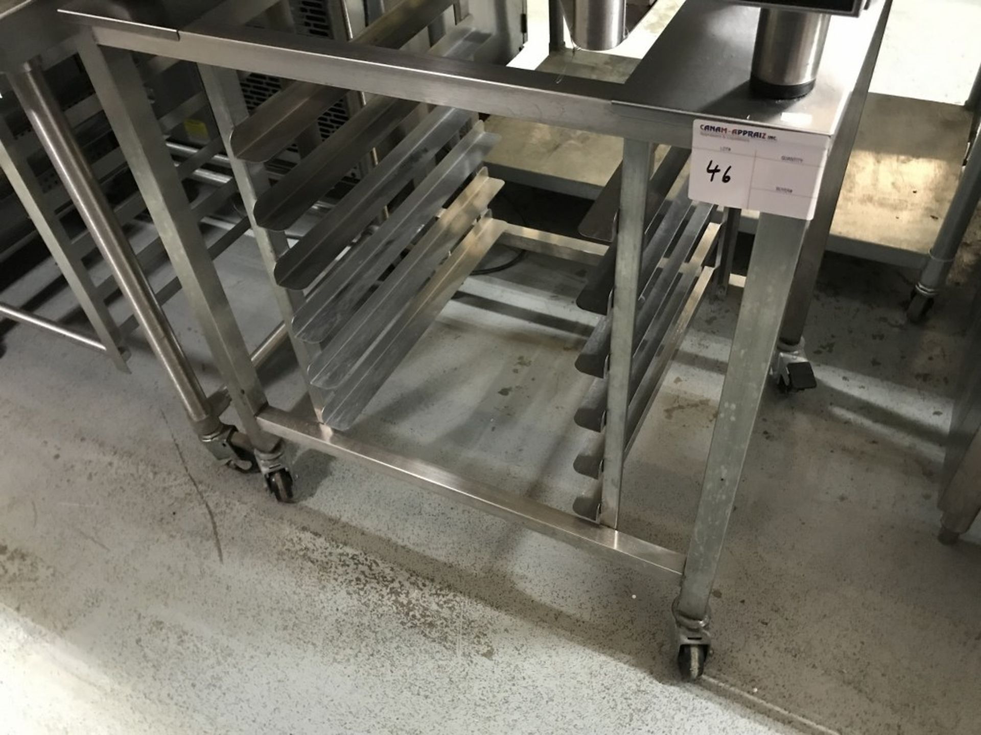 STAINLESS STEEL TABLE WITH TRAY RACK ON CASTERS - Image 2 of 2