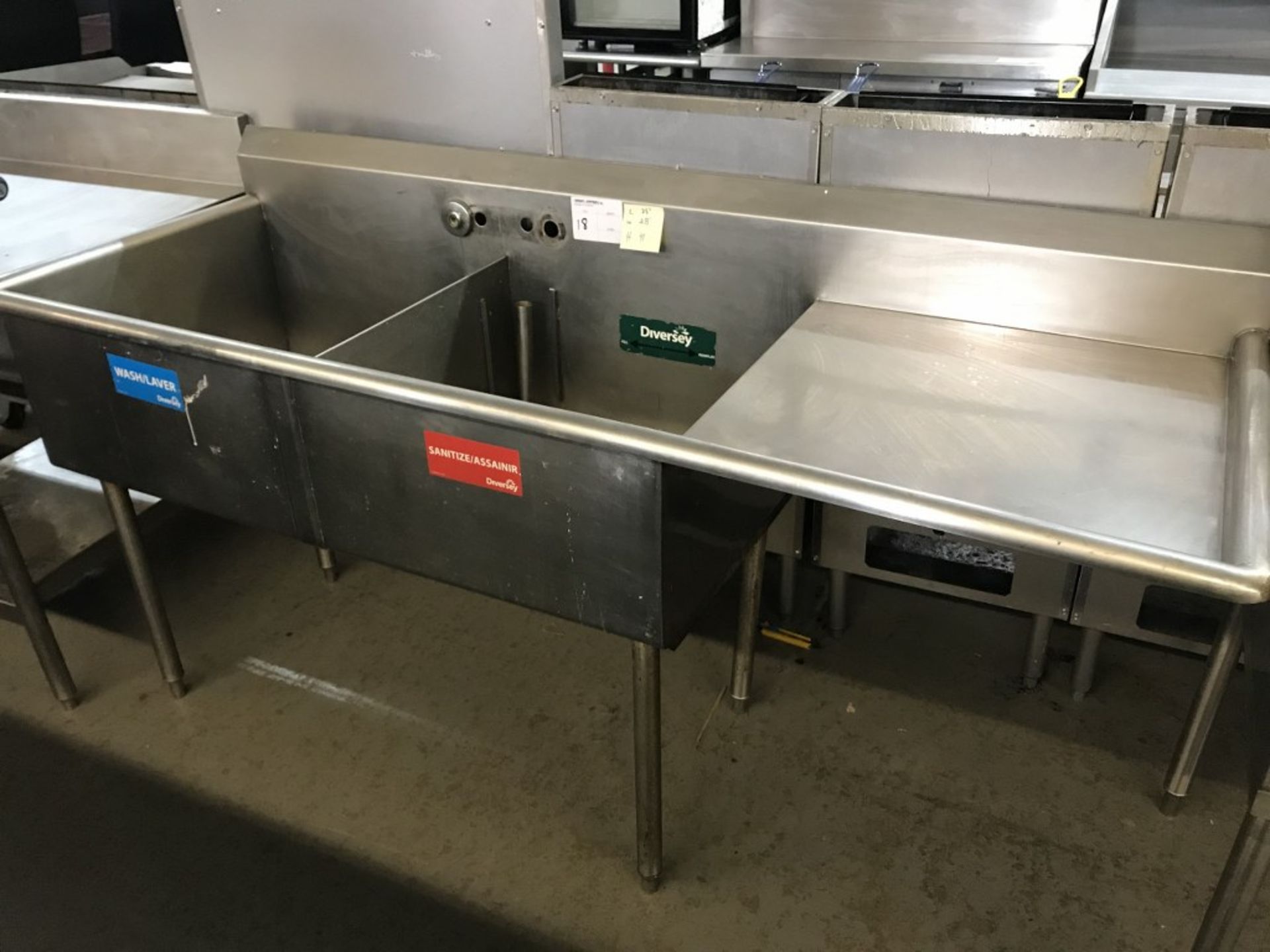 2-WELL STAINLESS STEEL SINK. 75"L X 28"W X 41H