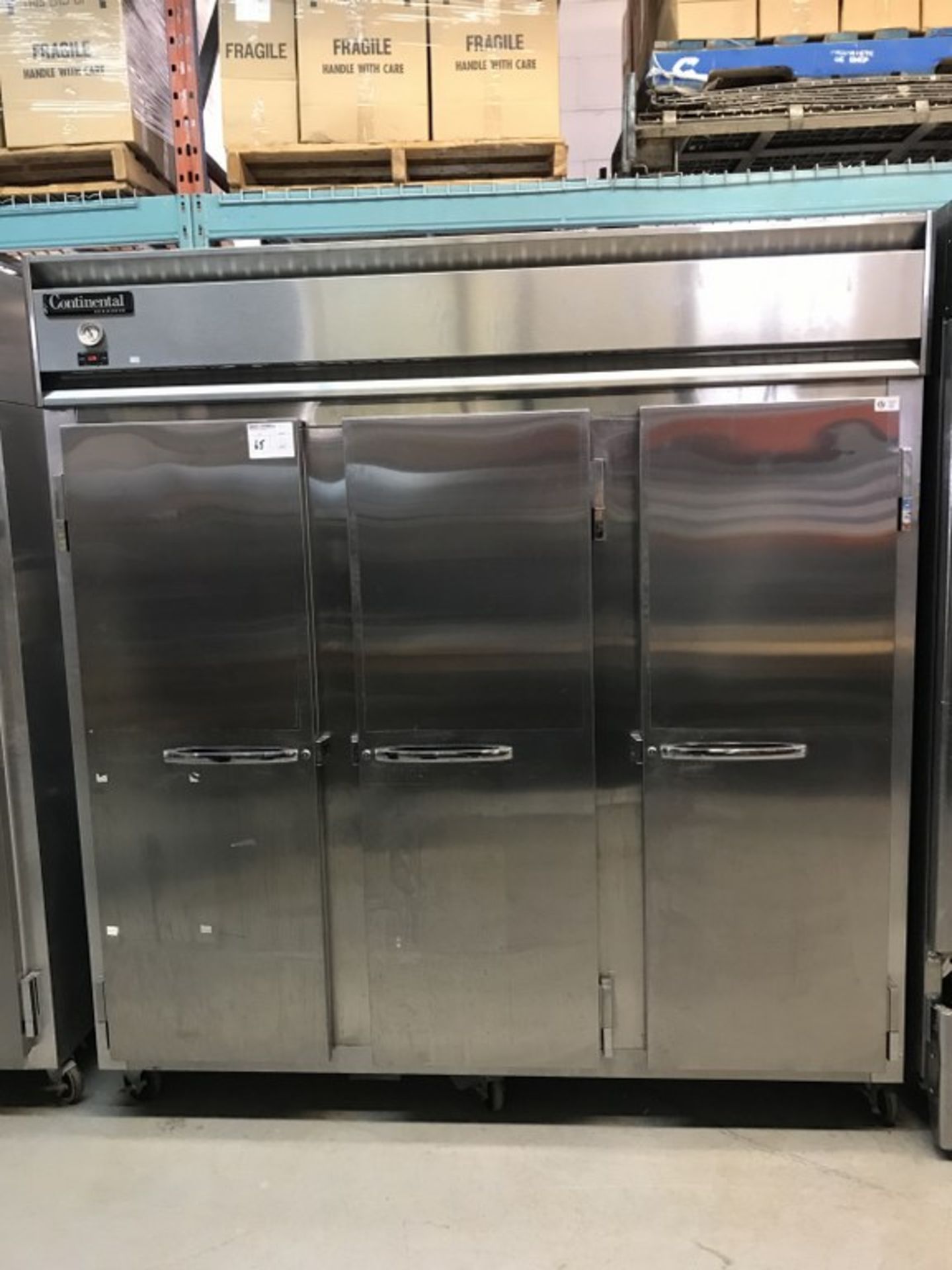 CONTINENTAL - 3-DOOR STAINLESS STEEL REFRIGERATOR. MODEL # 3R