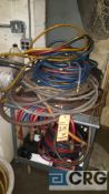 Lot of assorted air and water hoses etc, with cart.