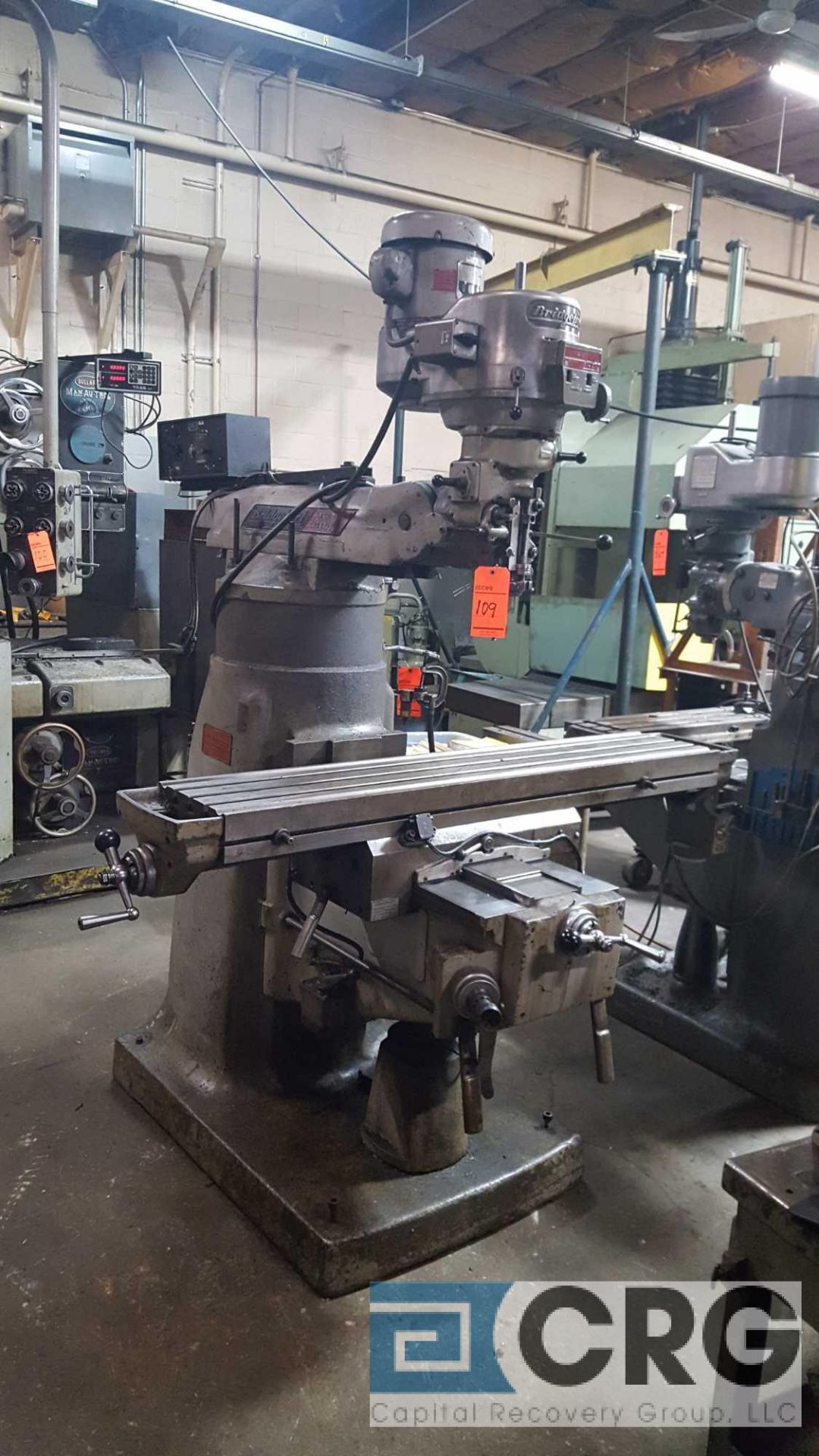 Bridgeport vertical milling machine, with Trak DRO, 9" rise, 11" x 60" T slot table, serial no