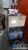 Miller Dialarc HF constant current AC/DC arc welder power source, portable, with foot pedal control.