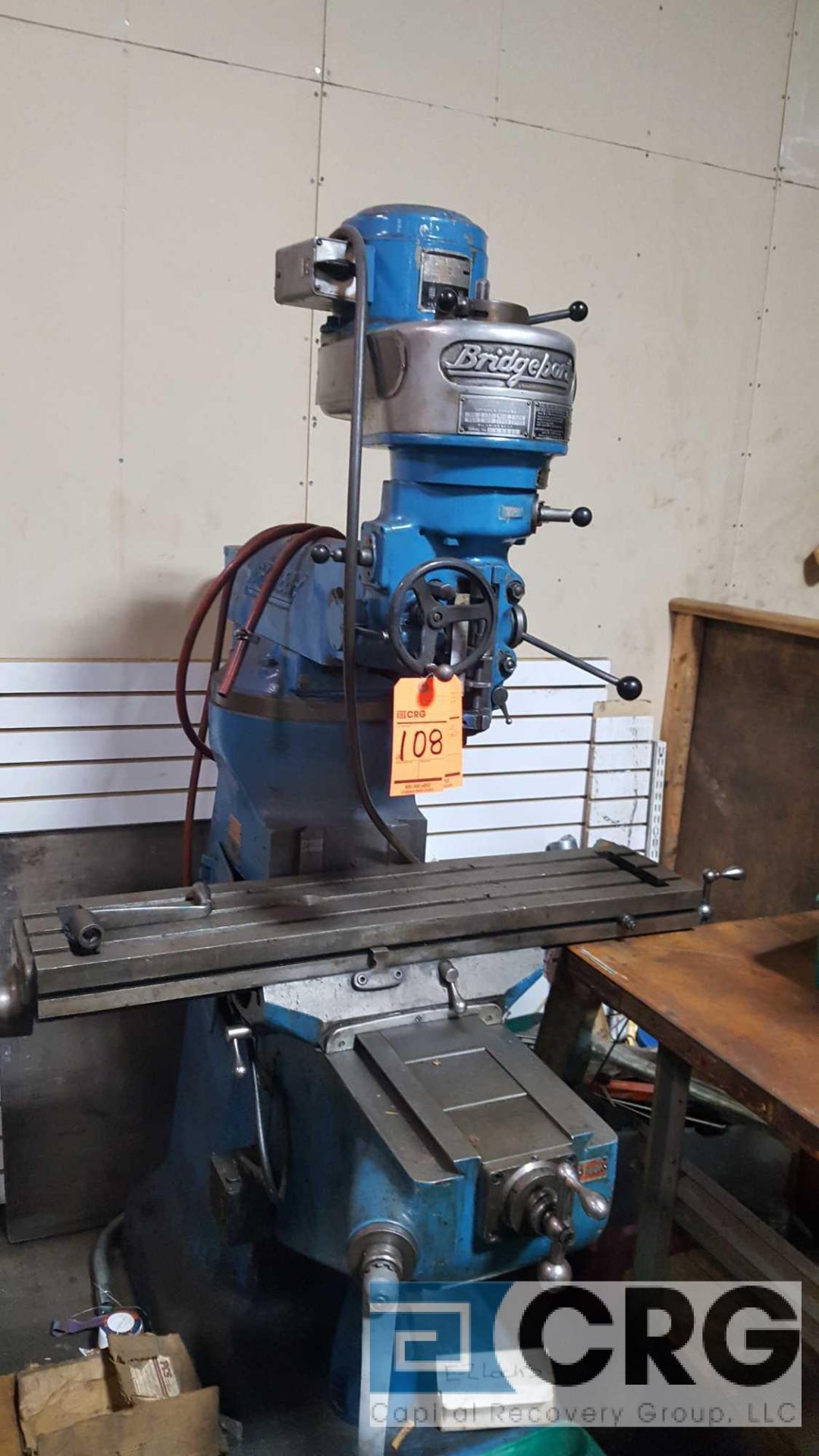 Bridgeport vertical milling machine, series I, 9" x 42" T slot table, serial no 100582.