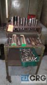 1 lot of assorted taper tool holders and assorted end mills, with the cart