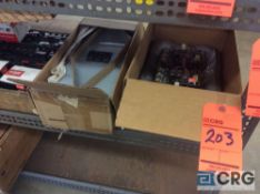 Lot of electrical parts including relays, switch panel, and ballasts