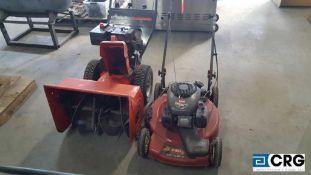 Lot includes one Ariens ST824, gas snow thrower, with 8 hp motor, and one Toro 22 inch gas lawn