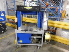 Dynark banding machine with discharge roller conveyor, 5 ft. long by 18 in. wide, mobile, asset #