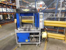 2002 Dynark banding machine with discharge roller conveyor, 5 ft. long by 18 in. wide, asset # T488,