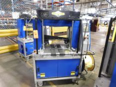 2002 Dynark banding machine with discharge roller conveyor, 5 ft. long by 18 in. wide, asset # T483,