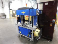 Dynark banding machine with discharge roller conveyor, 5 ft. long by 18 in. wide, m/n NP3, s/n 8010