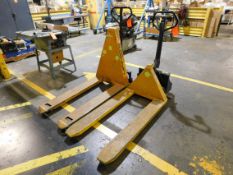 Lot of (2) battery powered pallet jacks, (1) 5,000 lbs. capacity, (1) 2,000 lbs. capacity