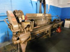 Hendey engine lathe with 15 in. 4-way chuck, 13 ft. long by 18 in. wide bed, tool holder, tail