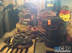 Lot of asst hoses including garden hose, air hose, compressor hoses, etc