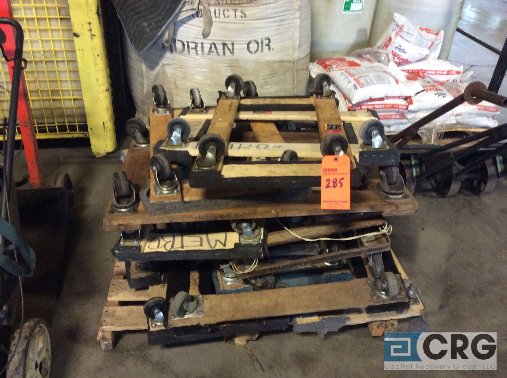 Lot of wood moving dollies