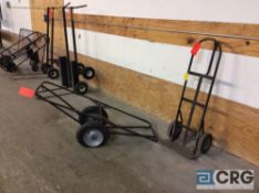 Lot of (2) assorted dollies, one standard two wheel hand truck with solid tires, and one two wheel