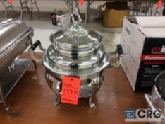 Stainless steel soup tureen with stand, warming pan, insert and cover.