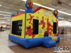 Elmo's World inflatable bounce house, 15 x 15' , with blower.