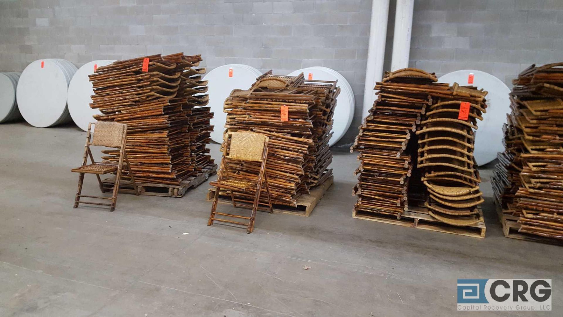 Lot of (125) assorted bamboo folding chairs.