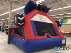 ATV Bounce house with blower. Item is too tall for complete indoor inflation For photographs.