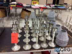 Lot includes (26) candle holders, (26) metal shades, and (6) glass globes.