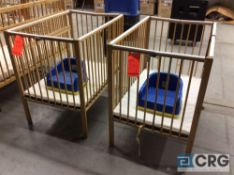 Lot includes (2) wood baby cribs and (2) plastic booster seat.