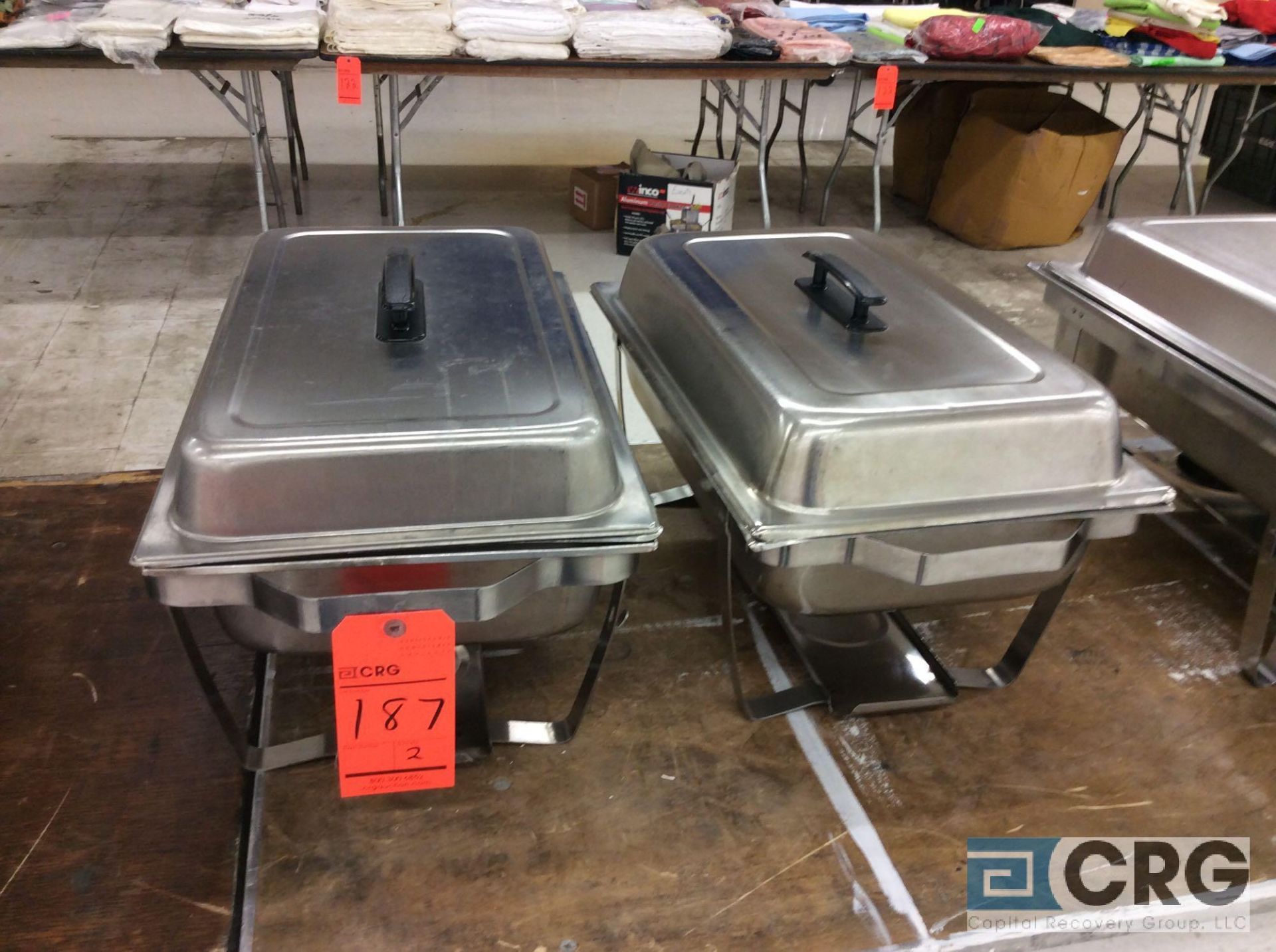 Lot of (2) assorted SS chafers, each with stand, warming pan, food pan insert, and cover.