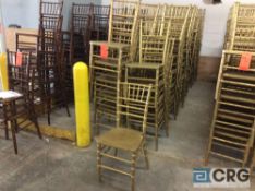 Lot of (60) gold chivari chairs.