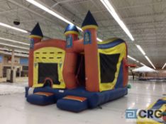 Inflatable castle type bounce house, with blower.