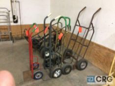 Lot of (4) assorted two wheel dollies, two with solid tires and two with pneumatic tires.