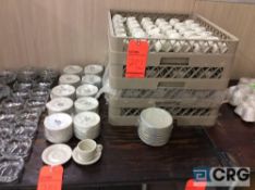 Lot of (132) demitasse/ espresso cups, (102) saucers, with (3) plastic cup trays.