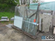 Lot of (12) assorted glass panels with rack