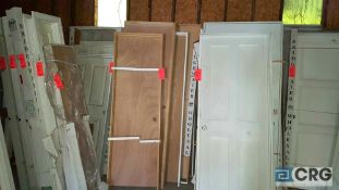 Lot of (23) assorted pre hung doors