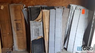 Lot of assorted vinyl siding and shutters