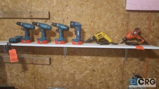 Lot of (6) assorted power tools, including (3) Makita cordless drills, with charger, flashlight, and