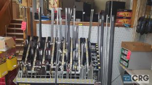 Lot of assorted threaded rod, angle iron, steel weld tubing, and assorted springs, etc, with display