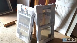 Lot of (2) Anderson silver line double hung vinyl windows, new, sealed in packaging from