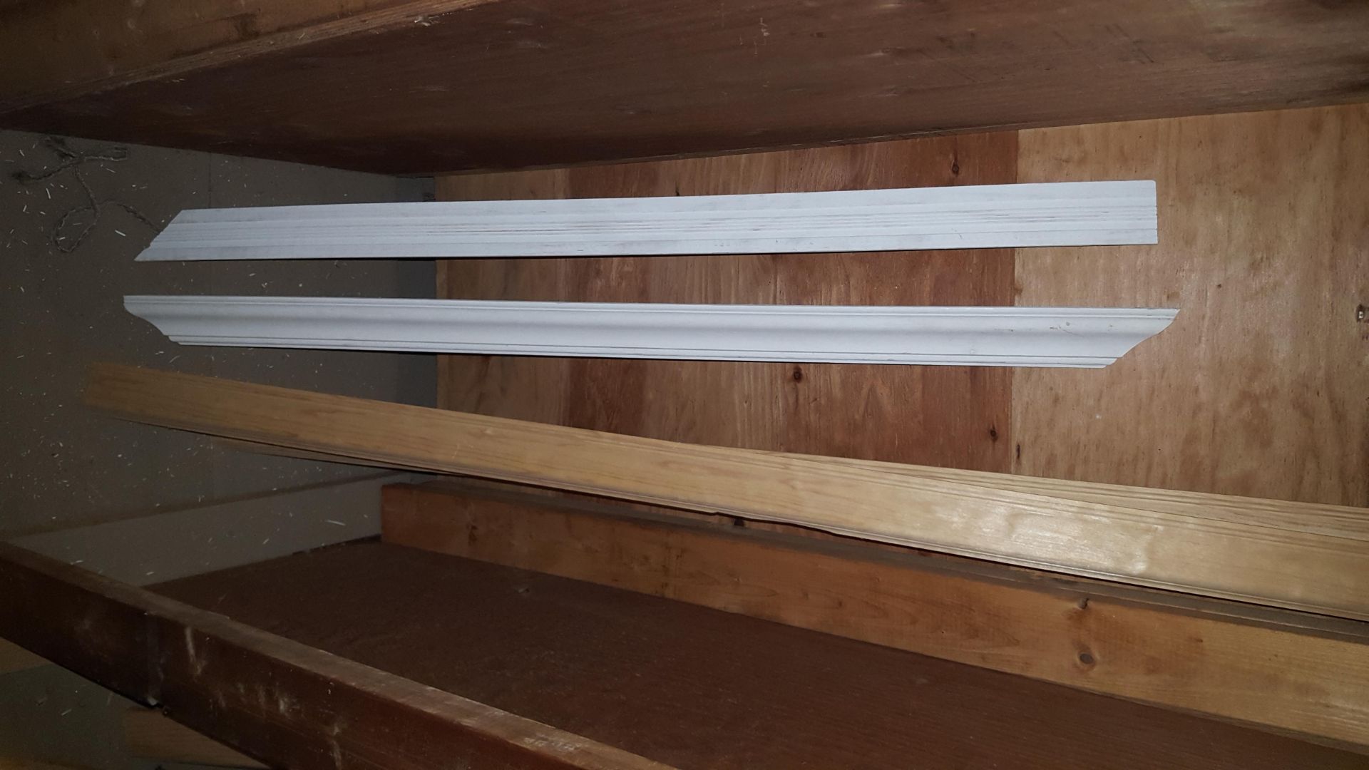 Lot of 333 linear ft. of assorted wood molding, including 15 ft. of 2 5/8 in. chair rail, clear