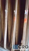 Lot of 56 linear ft. of assorted wood molding including 40 ft. of 1 1/4 in. col stop and 16 ft. of 1