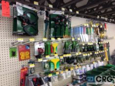 Lot of lawn and garden accessories including water hose nozzles, sprinklers, fertilizer spreaders,