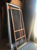 Lot of (29) assorted sliding and hinged screen doors