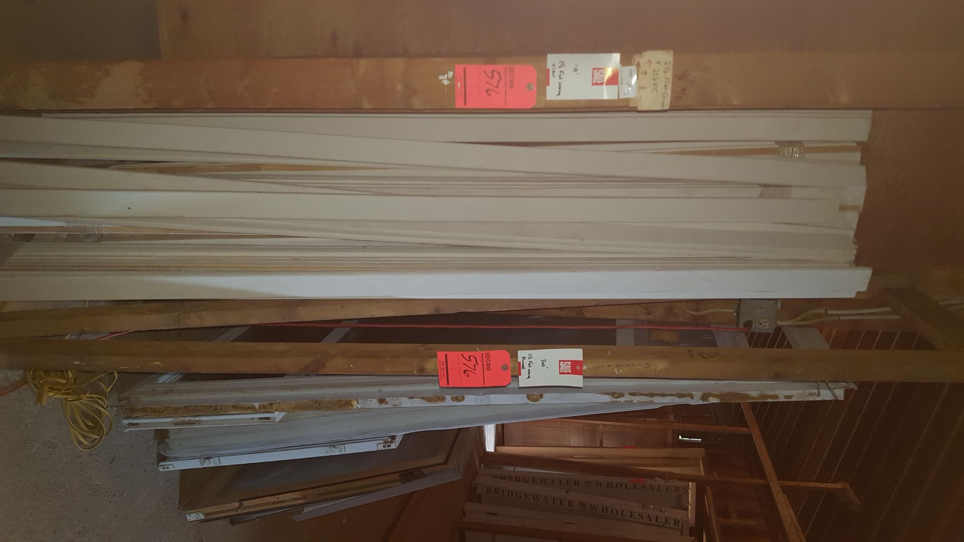 Lot of 333 linear ft. of assorted wood molding, including 15 ft. of 2 5/8 in. chair rail, clear - Image 2 of 3