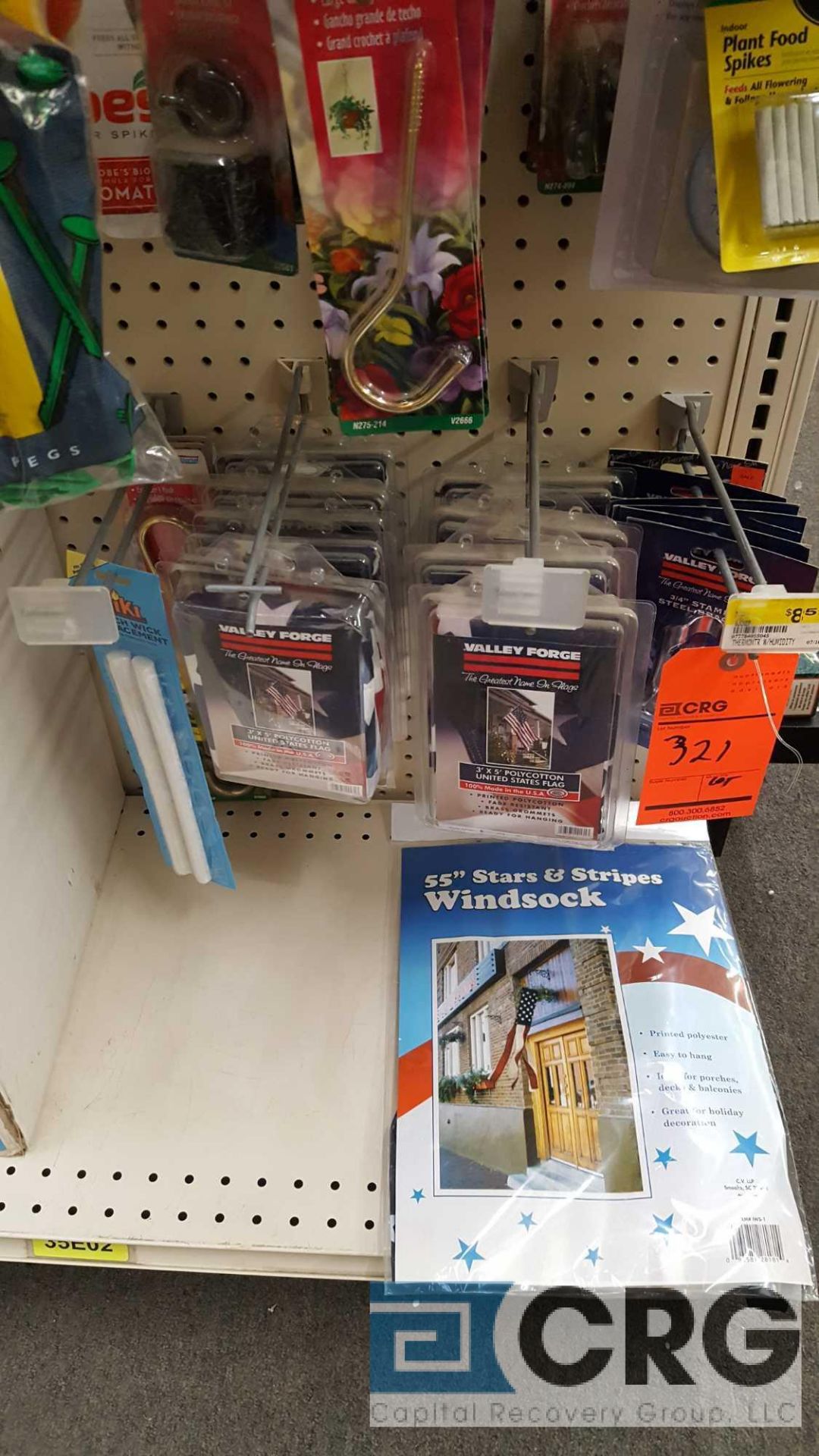 Lot of American flags, hanger hooks, etc with sunglasses and display, located in front counter. - Image 3 of 3