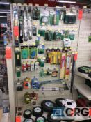 Lot of mower and weed eater supplies including trimmer line, spark plugs, tires, filters, and