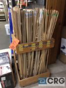 Lot of wood dowels with stand